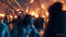 a movie poster for avatar fire and air shows a group of people
