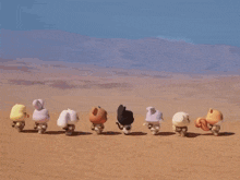 a row of cartoon animals are walking in a desert