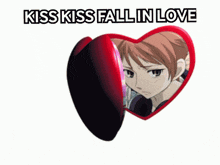 a heart shaped mirror with the words kiss kiss fall in love written above it