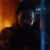 a close up of a man behind bars with the words " ii " and " ii " visible