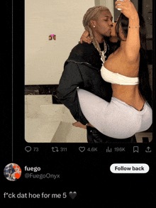 a picture of a man carrying a woman with a follow back button on the bottom right