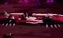 a monster is laying on the ground in a pool of blood .