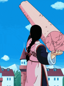 a girl in a pink shirt that says " all you "
