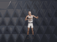 a basketball player with the number 55 on their jersey is jumping in the air