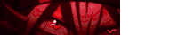 a close up of a person 's eyes in a dark room with a red background .