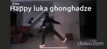 a tik tok video of a person dancing with the words happy luka ghonghadze