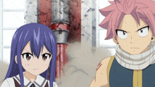 a girl with blue hair and a boy with pink hair are standing next to each other in a room