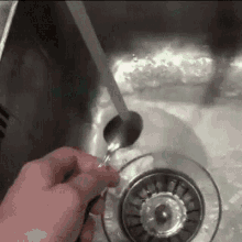 Washing Spoon GIF