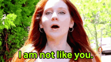 a woman with red hair says that she is not like you