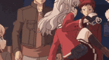 a group of people are standing around a girl in a red jacket .