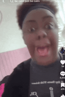 a girl is making a funny face while wearing a shirt that says hd on it