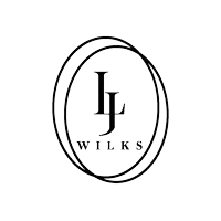 a black and white logo for wilks with the letter l in the center