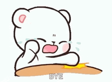 a cartoon bear is crying while sitting at a table and saying bye .