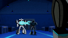 two transformers are standing in a room with a blue light coming out of their mouths