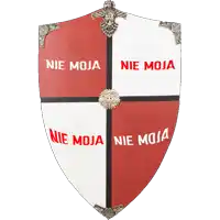a red and white shield with nie moja written on it