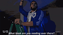 Johnny Gargano What Book Are You Reading GIF - Johnny Gargano What Book Are You Reading Promo GIFs
