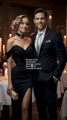 a man in a suit and a woman in a dress are posing for a picture