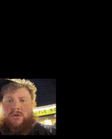 a man with a beard is standing in front of a green sign that says ' chinese food '