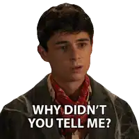 a man with a bandana on his neck says why didn 't you tell me