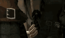 a blurred image of a person standing in a dark room .