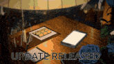 a cartoon drawing of a desk with the words update released