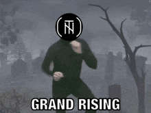 a man in a black suit is kneeling in front of a cemetery with the words grand rising above him