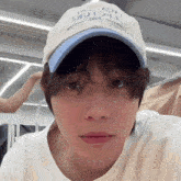 a close up of a person wearing a baseball cap that says ' i love you ' on it