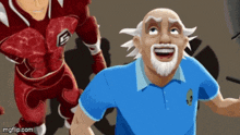 a man in a blue shirt with a skull on it is smiling