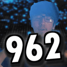 a man with glasses and the number 962 on his face