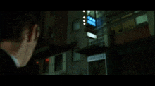 a man in a suit says no lieutenant in a dark room