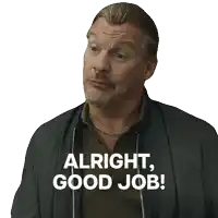 a man with a ponytail is smiling and says " alright good job "