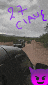 a picture of a dirt road with 27 ciaue written on the side