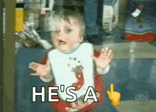 a baby says he 's a with a hand pointing at him