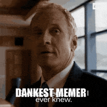 a man in a suit and tie says " dankest meme "