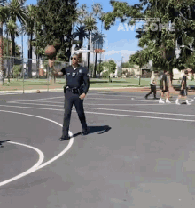 Policeman Basketball GIF - Policeman Basketball Spin GIFs