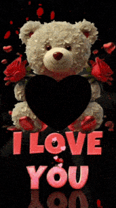 a teddy bear is holding a black heart with the words i love you behind it