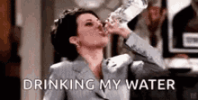 Karen Walker Drinking GIF - Karen Walker Drinking Chug GIFs