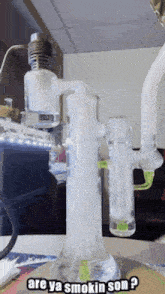 a beaker with smoke coming out of it and a caption that says are ya smokin son