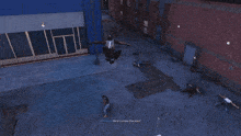a man in a spiderman suit is being thrown in the air by another man