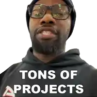 a man wearing glasses and a black hoodie with the words tons of projects on it