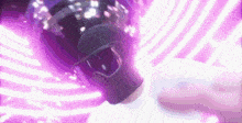 a person wearing a helmet and sunglasses is flying through a purple tunnel .