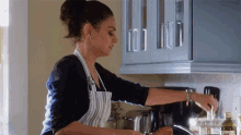 Mila Kunis A Bad Moms Christmas GIF - Mila Kunis A Bad Moms Christmas Cooking GIFs