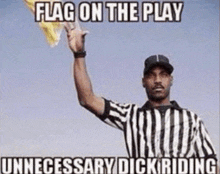 a referee in a striped shirt is holding up a yellow flag .