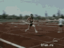 a blurred image of a person running on a track with ifun.ru written on the bottom