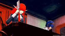a woman with red hair is sitting at a table next to a man in a blue hat .