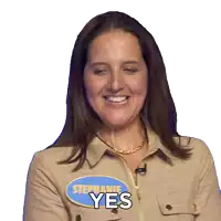 a woman with a name tag that says stephanie yes is smiling