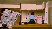 a man is reading a newspaper while a woman is cooking in the kitchen