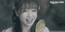 a rakuten viki ad shows a woman laughing