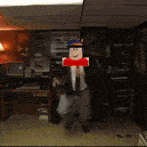 a man in a suit and tie is dancing in a room with a red box in front of his face
