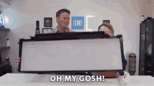 Oh My Gosh Lincoln And Dan GIF - Oh My Gosh Lincoln And Dan Whats Inside Tesla Biodefence Filter GIFs